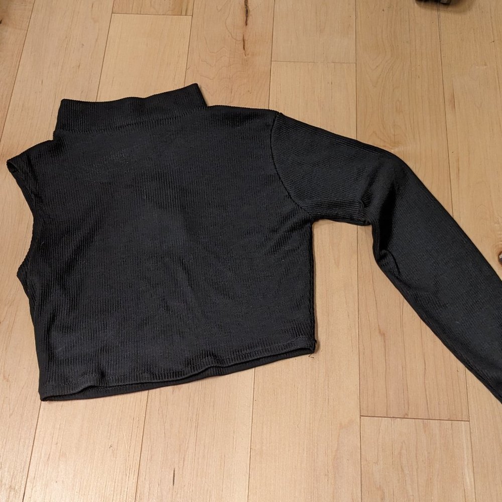 Asymmetrical black crop top